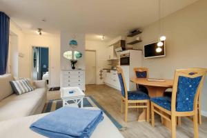 Ferienwohnung-5-mit-Terrasse-Friesenhus-Weisse-Moewe-Duhnen