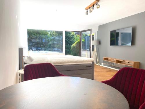 Ferienwohnung am Schliersee - Mit eigenem Garten & Bergblick, perfekt zu zweit