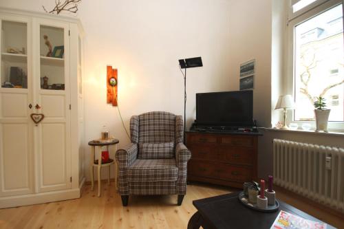 Ferienwohnung, gemütlicher Altbau mit Balkon nähe Fürstenplatz und Königsallee