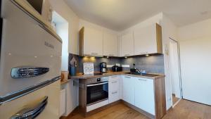 Ferienwohnung Gustav - Moderne Maisonette-Wohnung mit Terrasse