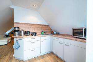 Ferienwohnung im Reetdachhaus