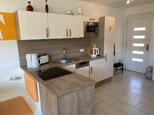 Ferienwohnung KWi 72 EG - \