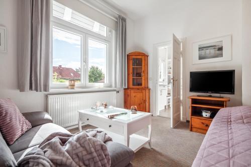 Ferienwohnung LEE im Kapitänshaus OSTSEEROSE