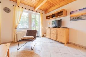 Ferienwohnung Lüttje Huck - Seeblick 4