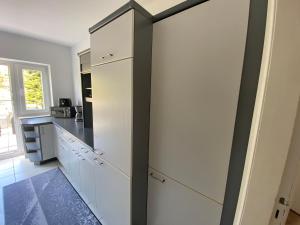 Ferienwohnung mit Balkon und Garten OG