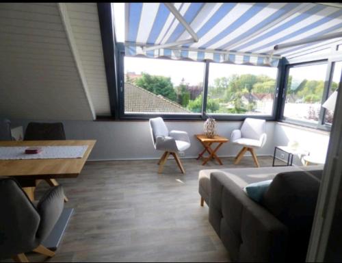 Ferienwohnung mit Wintergarten Böttcherweg 6