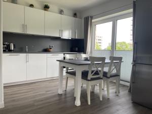 Appartement Ferienwohnung Moin! Seeuferweg 7 + 7a 24351 Damp Schleswig-Holstein