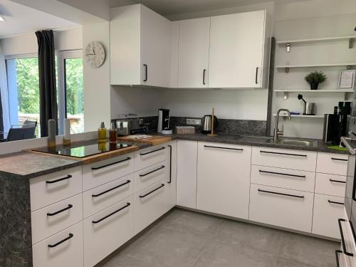 Firmen & Ferienwohnung Brecht 2