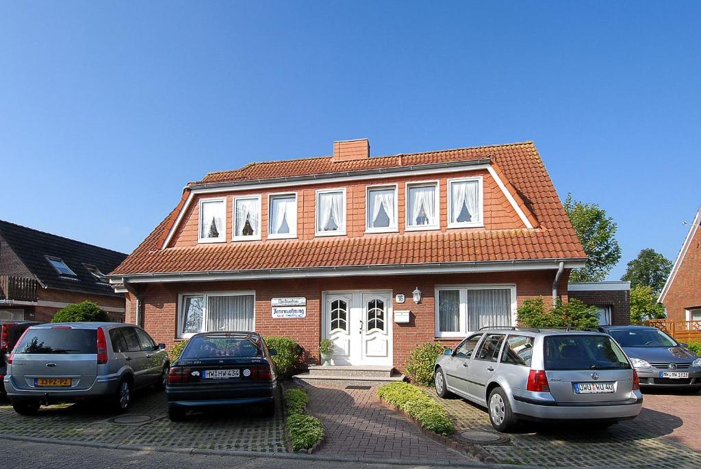 Friesenmeer Ferienwohnung Vier Friesenstraße 16, 26427 Bensersiel
