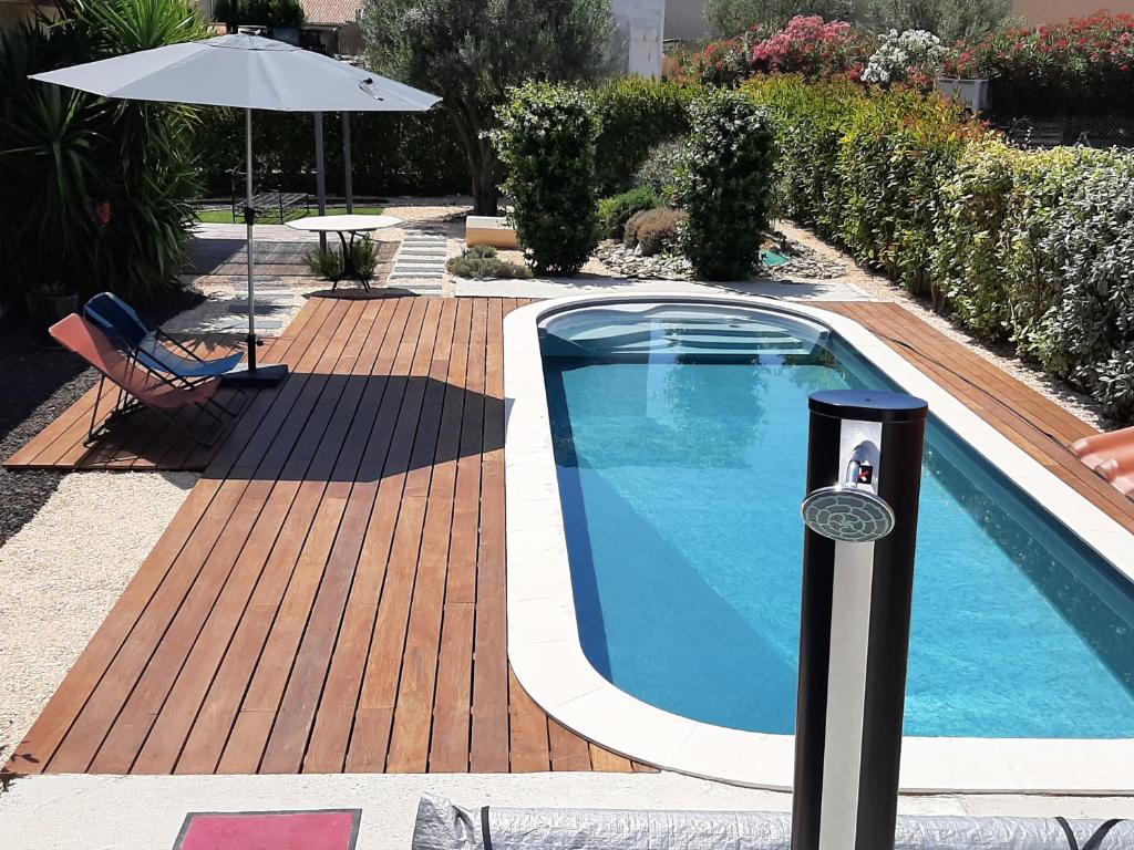 Appartement Gîte du Soleil, climatisé avec piscine chauffée d'avril à novembre, et jacuzzi 11 Avenue Pasteur 34480 Pouzolles