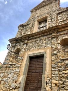 Appartement Grand studio Montegrosso Place de l'église Lunghignano 20214 Montegrosso Corse