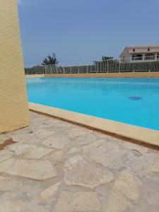 Ground floor studio with access to beach and pool