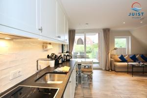 Haus Achterhus 214 - Wohnung 14 \
