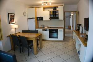 Haus Blick zur See FeWo 08 Gartennutzung, Meerblick, Sauna- und Schwimmbadnutzung im AHOI Sellin