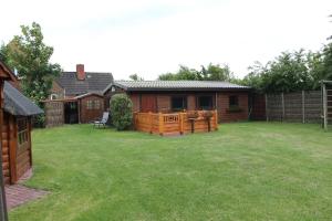 Appartement Haus Seerobbe-Blockhaus im Garten Westküstenstraße 13 23769 Fehmarn Schleswig-Holstein