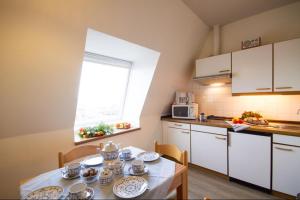 Appartement Haus Therese Ferienwohnung *Feodora* (App.11) Volkert-Quedens-Straße 2 25946 Wittdün Schleswig-Holstein