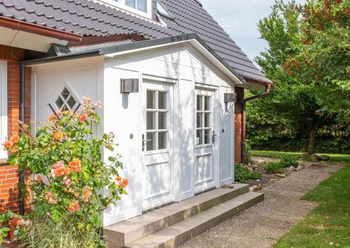 Haus Watthus - Wohnung Paradies