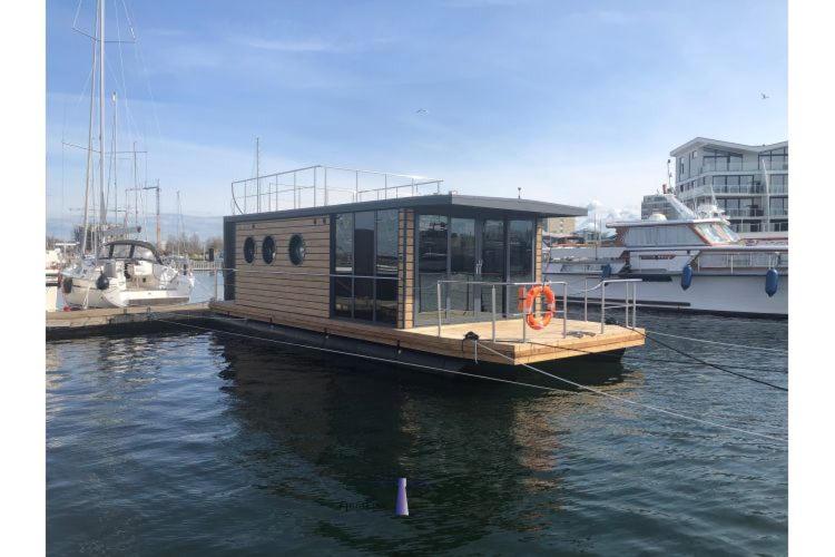 Hausboot Fjord Auriga mit Biosauna in Wendtorf An den Stegen 1, 24235 Wendtorf