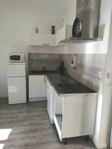 Appartement HELTY T2, logement neuf, tout équipé coeur du village, parking gratuit 6 Rue du Four Banal 34420 Portiragnes Languedoc-Roussillon