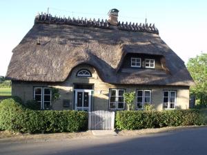 Historische Reetdach-Kate