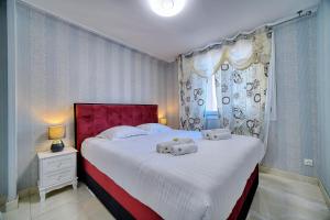 IMMOGROOM - Rénové - Parking - Climatisation - Balcon