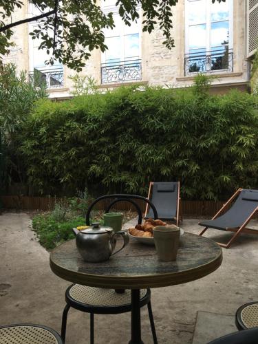 Jardin au calme, au cœur d'un hôtel particulier