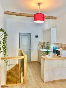 Joli duplex avec balcon et vue sur place du centre historique !