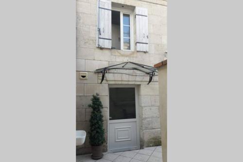 Joli petit loft dans échoppe pierre centre-ville