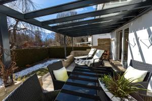 Kaminwohnung mit 24qm Südterrasse Nähe Zugspitze / Eibsee