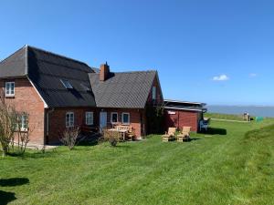 Appartement Kapitänshaus Meerblick 4 Hunnenswarf Wohnung im EG 25863 Langeneß Schleswig-Holstein