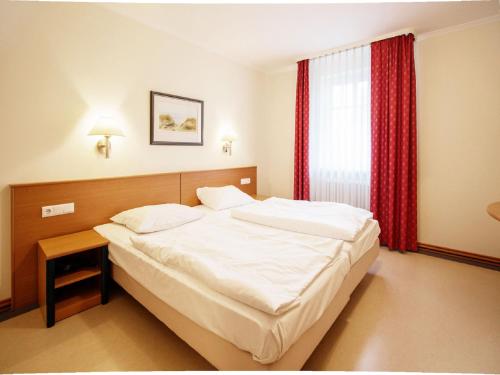 Klassik Appartement mit 1 Schlafzimmer und Balkon im Obergeschoss 019
