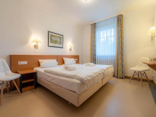 Klassik Appartement mit 1 Schlafzimmer und Balkon im Obergeschoss 107