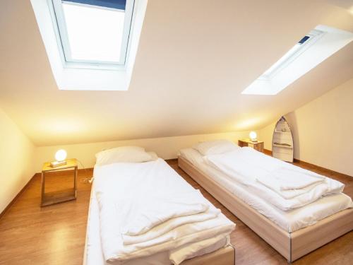 Komfort Appartement mit 1 Schlafzimmer und Balkon im Dachgeschoss 125