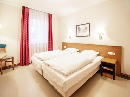 Komfort Appartement mit 1 Schlafzimmer und Balkon im Obergeschoss 300