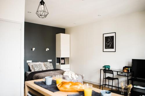 L'audacieux Studio lumineux rénové et équipé en centre ville