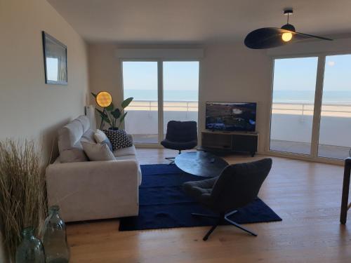 L'opaline - Vue plage-mer-digue-Wifi-Netflix-Parking abrité