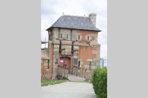 Appartement La Roulotte de Kastell Dinn - Unique et Insolite- cuisine commune Kerlouantec 29160 Crozon Bretagne