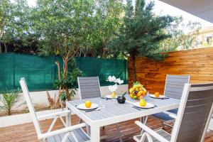 Le California - Plage Parking privé gratuit Terrasse