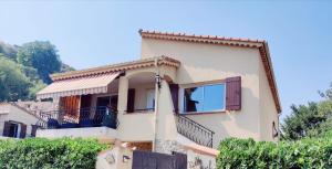 Le Castel - Haut de villa - climatisé - barbecue - jardin