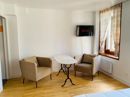 Le cottage des remparts - face hotel de ville