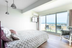 Le duplex village naturiste vue mer