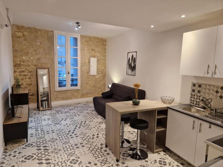 Le First Auversois charmant studio avec jardinet