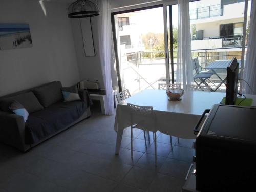 Appartement Appartement Le Grau-du-Roi, 2 pièces, 4 personnes - FR-1-250-175 145 ROUTE DE L'OUTARDE CANEPETIERE BAT C - ETAGE 1 - PORTE N° 102 Le Grau-du-Roi