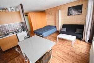 Le Relai S34 - Grand et lumineux studio avec coin montagne 4-6 pers, 50m des pistes, grand balcon exposé SUD, DRAPS NON COMPRIS