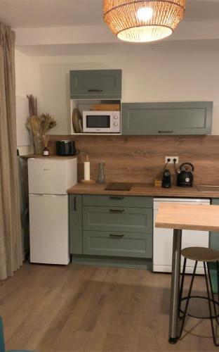 Le relais appartement aux charmes authentiques WIFI