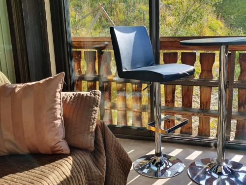 Le Serac W6 appartement avec véranda en angle vue panoramique