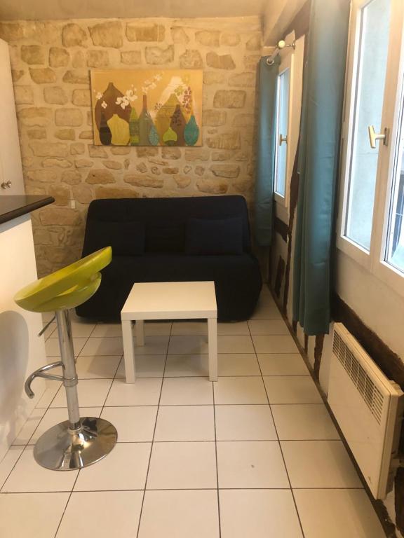 Appartement LE TEMPS D'UNE PAUSE 6 Rue de Birague 75004 Paris