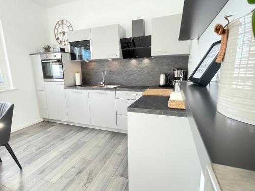 Lee-Moderne Neubauwohnung in Strandnähe - Wallbox
