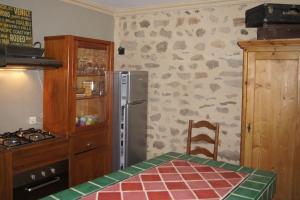 Appartement Les Pierres Blondes 10 rue de la poterne 63114 Montpeyroux Auvergne