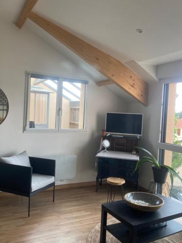 Loft avec terrasse sans vis a vis à 3km du circuit avec garage au calme